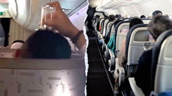 Passenger's bizarre use of drinking glass on flight leaves travelers horrified Accountant Find
